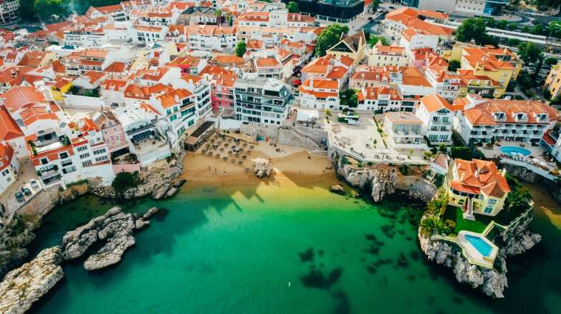 Get this aerial view of Praia da Rainha while spending 5 days in Portugal.