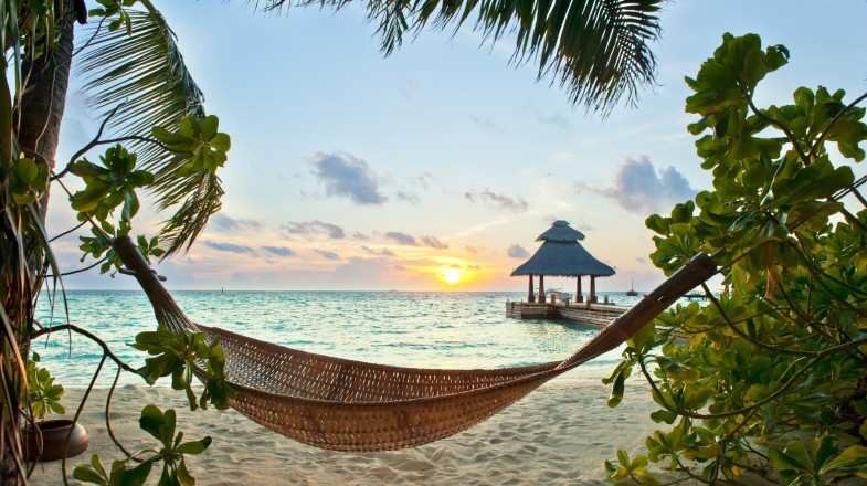 A hammock on a tropical beach in the Maldives in November.