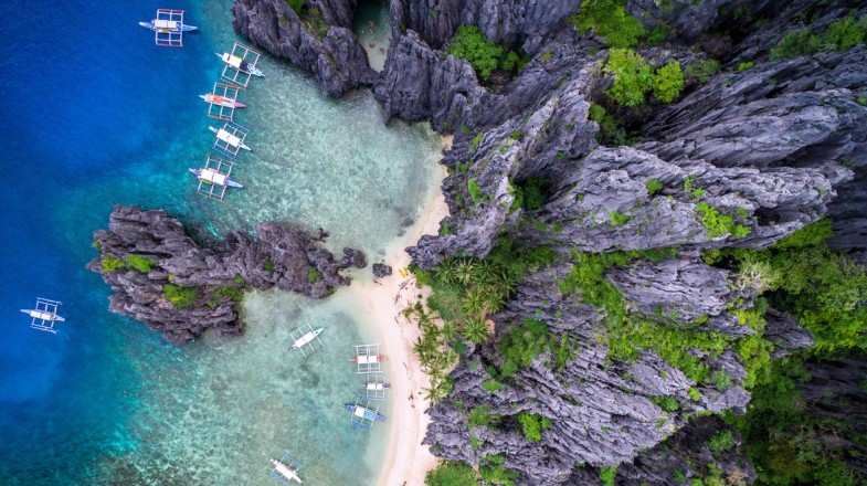 Boats on Bacuit Bay situated on the El Nido, Palawan, Philippines in June.