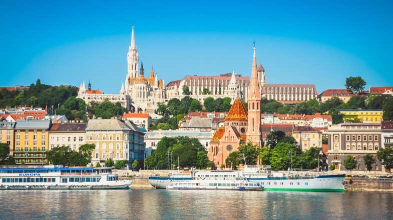 See Budapest skyline during bright summer days in Hungary in July.