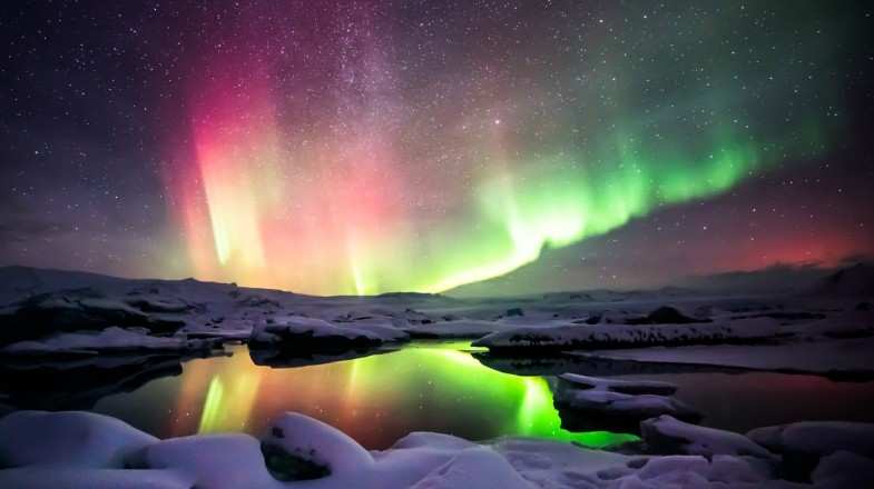 Aurora Borealis over Jokulsarlon glacier lagoon in Iceland