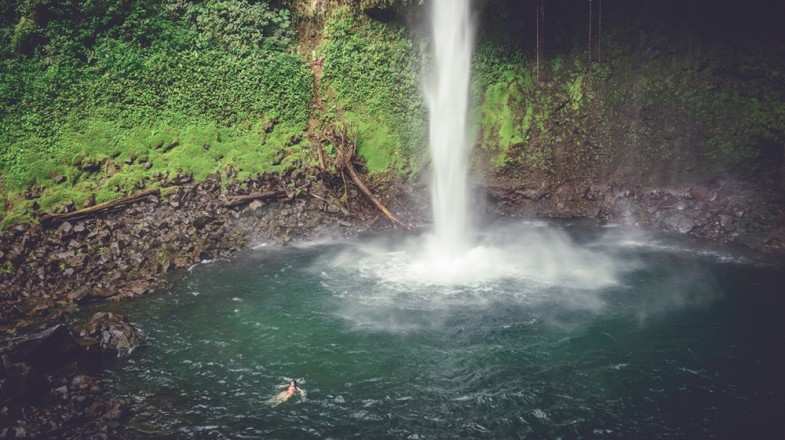 La Fortuna Waterfall is located within the Arenal Volcano National Park.