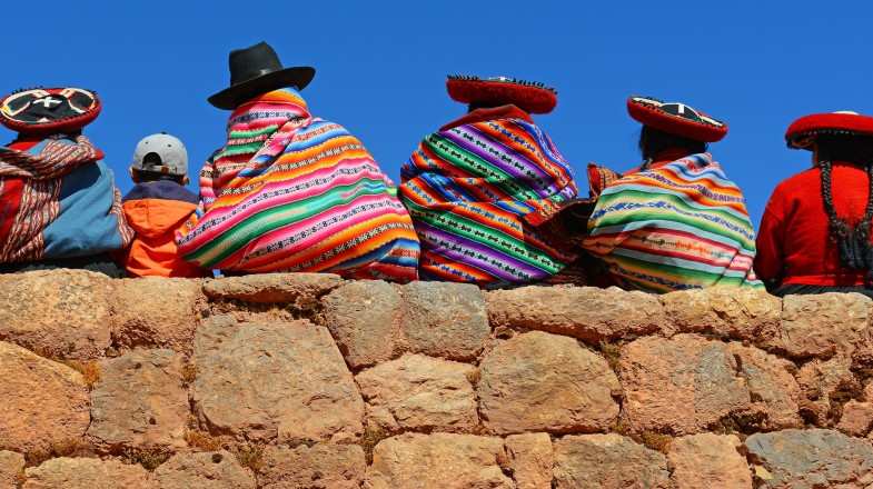 Quechua ladies with colorful textiles in Peru in May