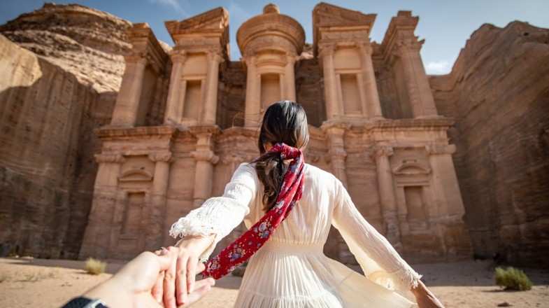 A girl enjoying the magnificence of Petra, one of the best places to visit in Jordan.