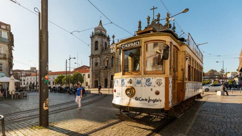 Old Fashioned trolley car in Porto, Portugal in August.