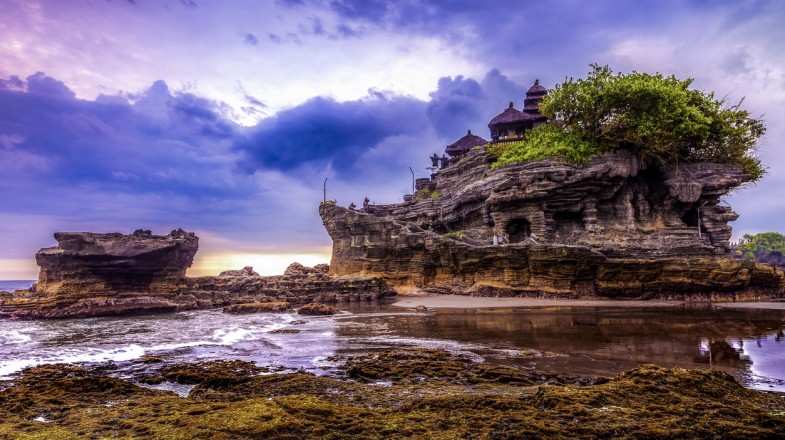 The Pura Tanah Lot temple in Bali is only accessible during low tide.