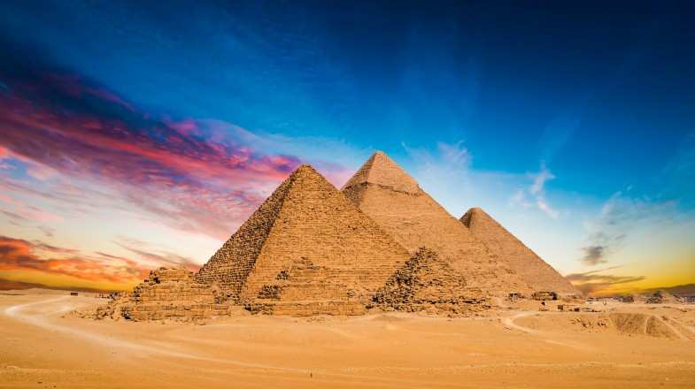 Gaze upon the Pyramids of Giza in Egypt in June.
