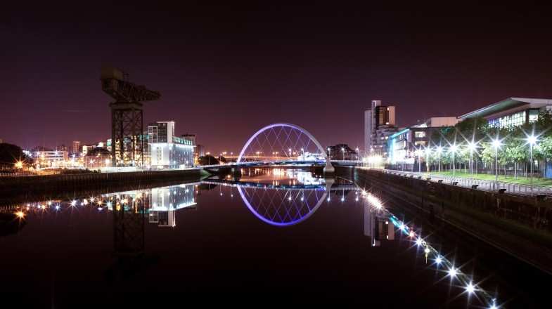 The reflection of Glasgow's Arc bridge in Scotland in June.