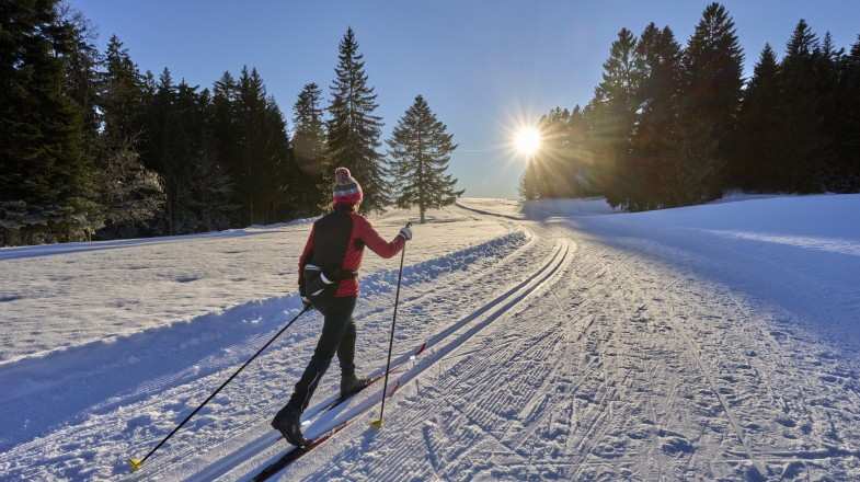 A woman skiing in the Alps in Germany in January.