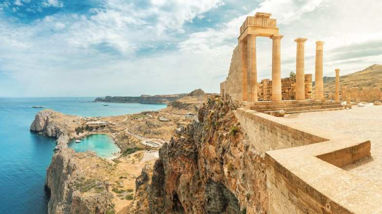 A view of Acropolis of Lindos with the ocean during summer in Greece.