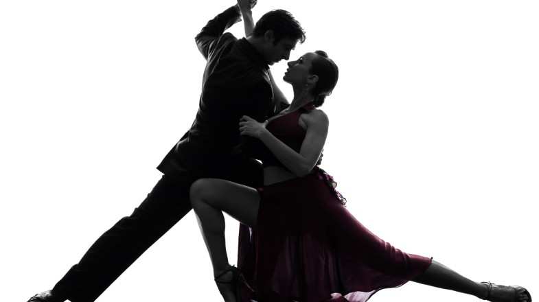 Couple performing tango dance, Argentine culture, and traditions.