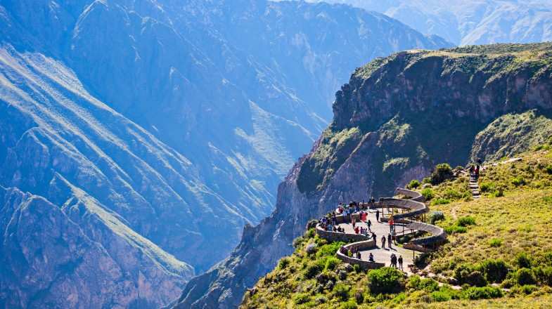 Plan a visit to the Colca Canyon to watch the majestic flight of the condor from the Cruz Del Condor viewpoint while spending 10 days in Peru.