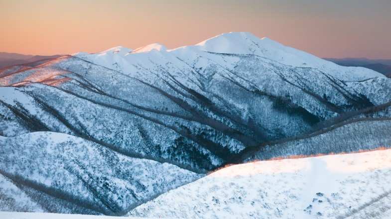 Mount Feathertop covered in snow at sunset in winter in Australia.