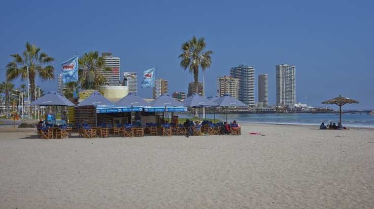 Cavancha beach in the coastal city of Iquique on a fine afternoon during summer in Chile.