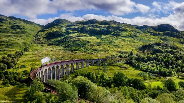 Steamtrain on the Glenfinnan Viaduct in Scotland in September.