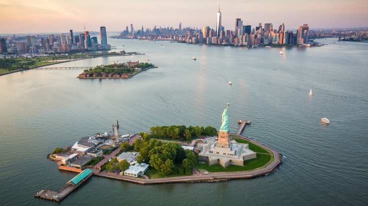 An aerial view of New York City and the Statue of Liberty. These are two of the best things to do in the USA.