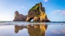 Spend 7 days in New Zealand and head to Wharariki Beach for relaxation.