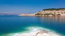 The Dead Sea is a salt lake bordered by Jordan and Israel.