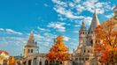 See Fisherman's Bastion with autumn foliage in Hungary in October.