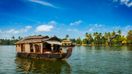 A houseboat floating on one of Kerala's backwaters