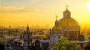 Scenic view at Basilica of Guadalupe with Mexico city skyline at sunset