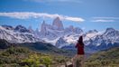 A girl tourist capturing the beauty of Mount Fitz Roy, one of the things to do in Argentina.