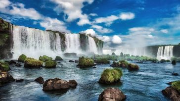 Beneath a dramatic, cloudy sky, the captivating grandeur of Iguazu Falls unfolded over 10 days in Brazil.