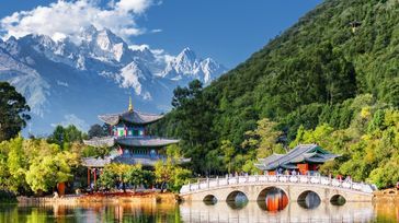 View of Jade Dragon Snow Mountain and Black Dragon Pool in China in July.