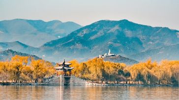 Summer Palace surrounded by autumn foliage in China in October.