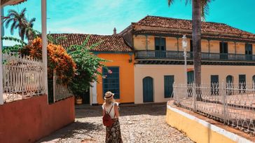 A young tourist exploring Trinidad, which is one of the best places to visit in Cuba.