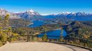 3 lakes surrounded by green, alpine land with snow-capped mountains — a sight from Bariloche that can easily be included while spending 2 weeks in Argentina.