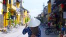 One of the best places to visit in Vietnam includes Hoi An, a well-preserved town by the river.