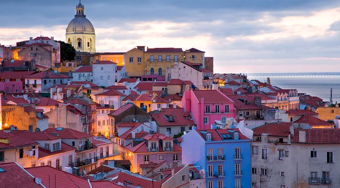 View on the old town Alfama in Lisbon Portugal in the very early morning with the street lights still burning