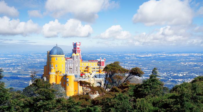 The Pena National Palace is a Romanticist palace in Sao Pedro de Penaferrim in the municipality of Sintra Portugal.