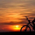 Silhouette with text top mountain bike tours in Nepal