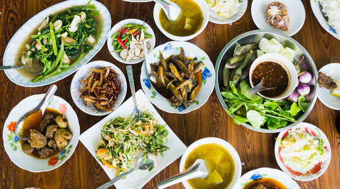 A table with Burmese Food