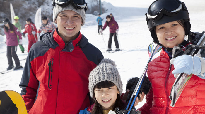 Family Smiling in Ski Resort