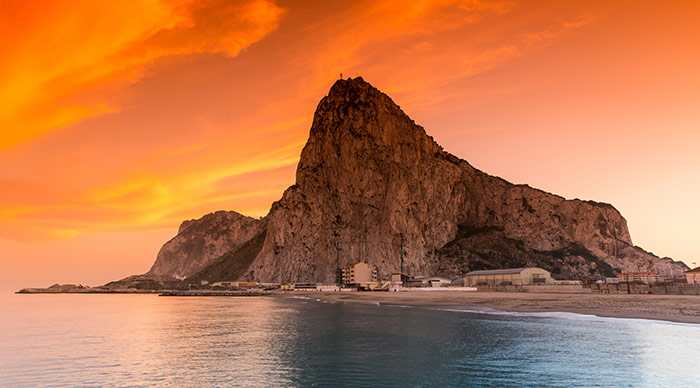 The rock of Gibraltar seen from the bay-side at sunset