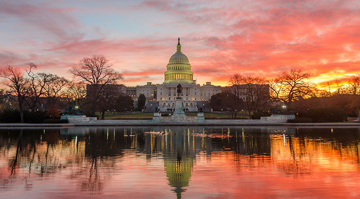 Washington DC capitol Building in a cloudy sunrise 