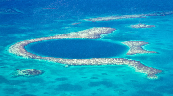 Aerial view of the great blue hole of the coast of Belize