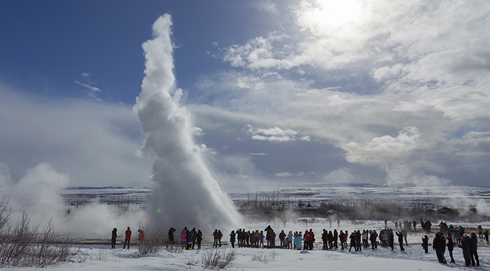 Tourists watching Iceland Geyser Strokkur Eruption