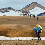 Hikers on the trail to the National Park of Landmannalaugar Iceland