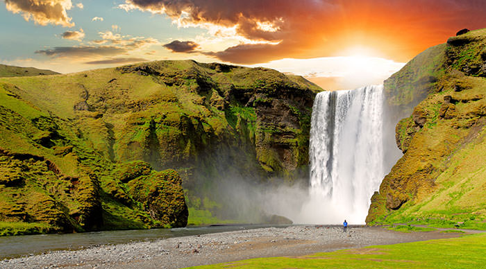 Famous waterfall Skogafoss in Iceland at sunset